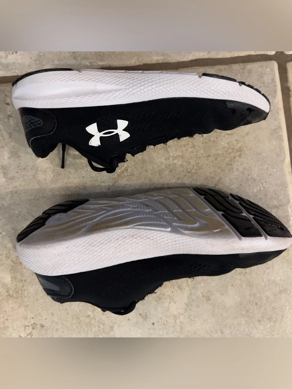 Under Armour Kids Black Athletic Running Shoes with White Soles